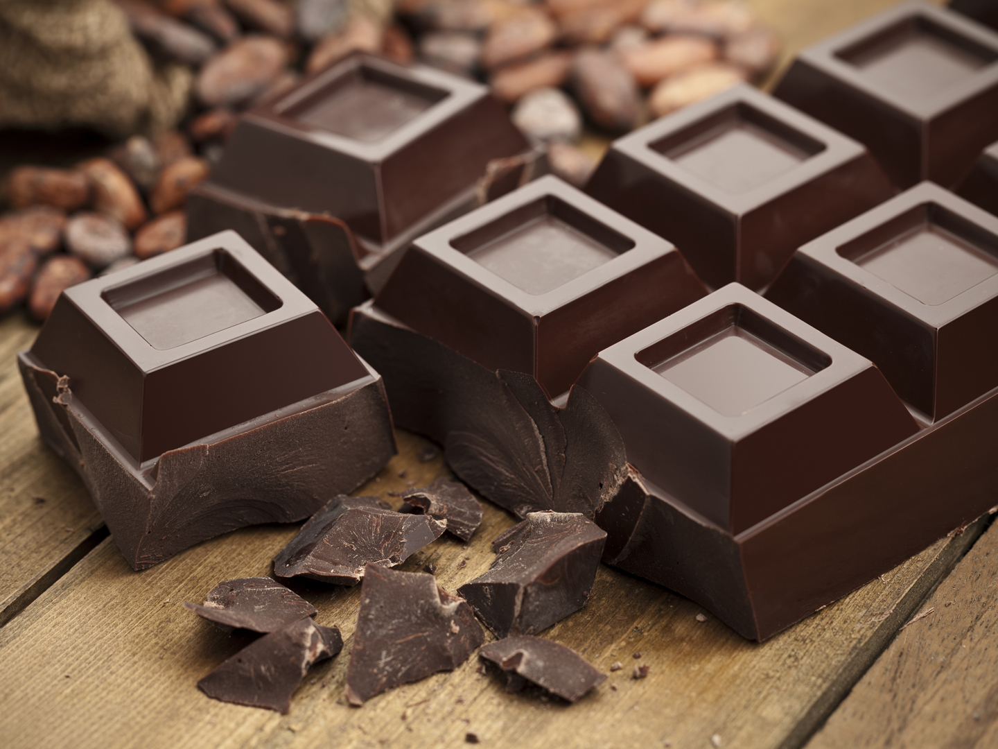 Dark Chocolate with Chunks on Wood Table