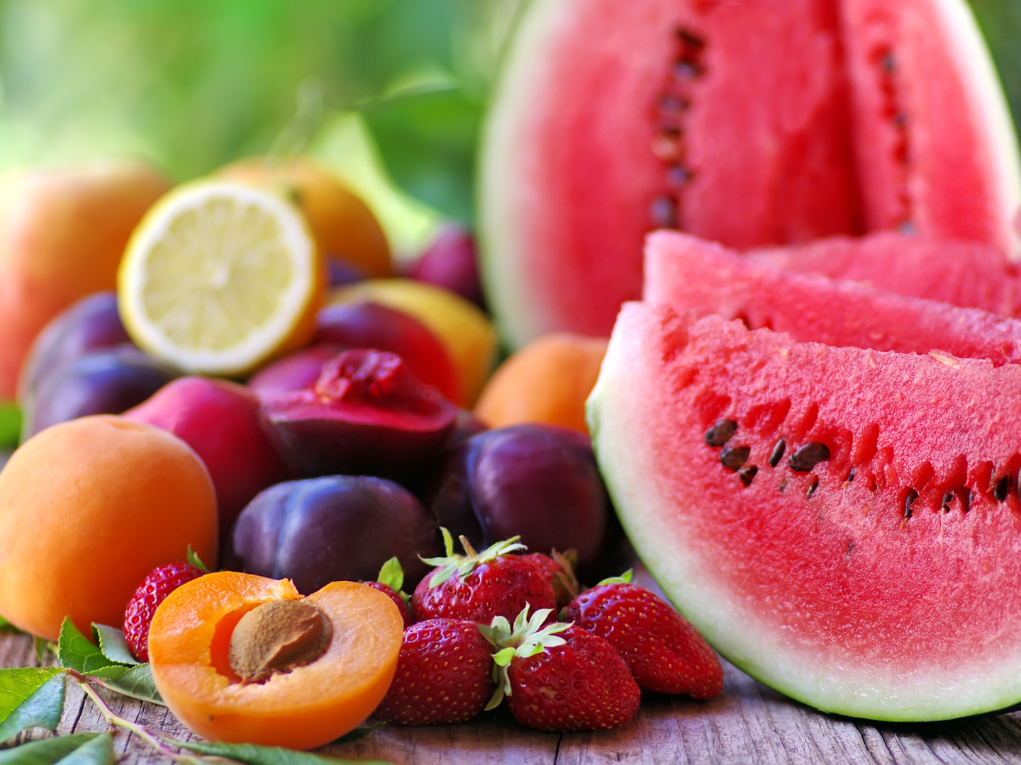 fresh fruits on wooden table