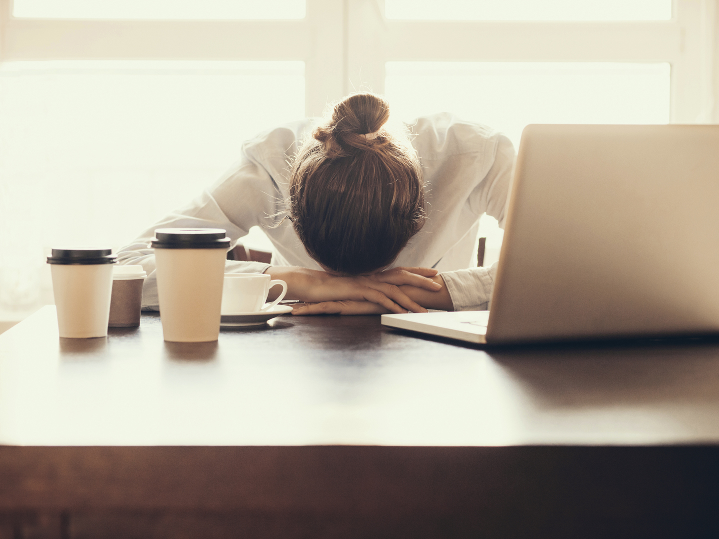 Tired businesswoman in the office