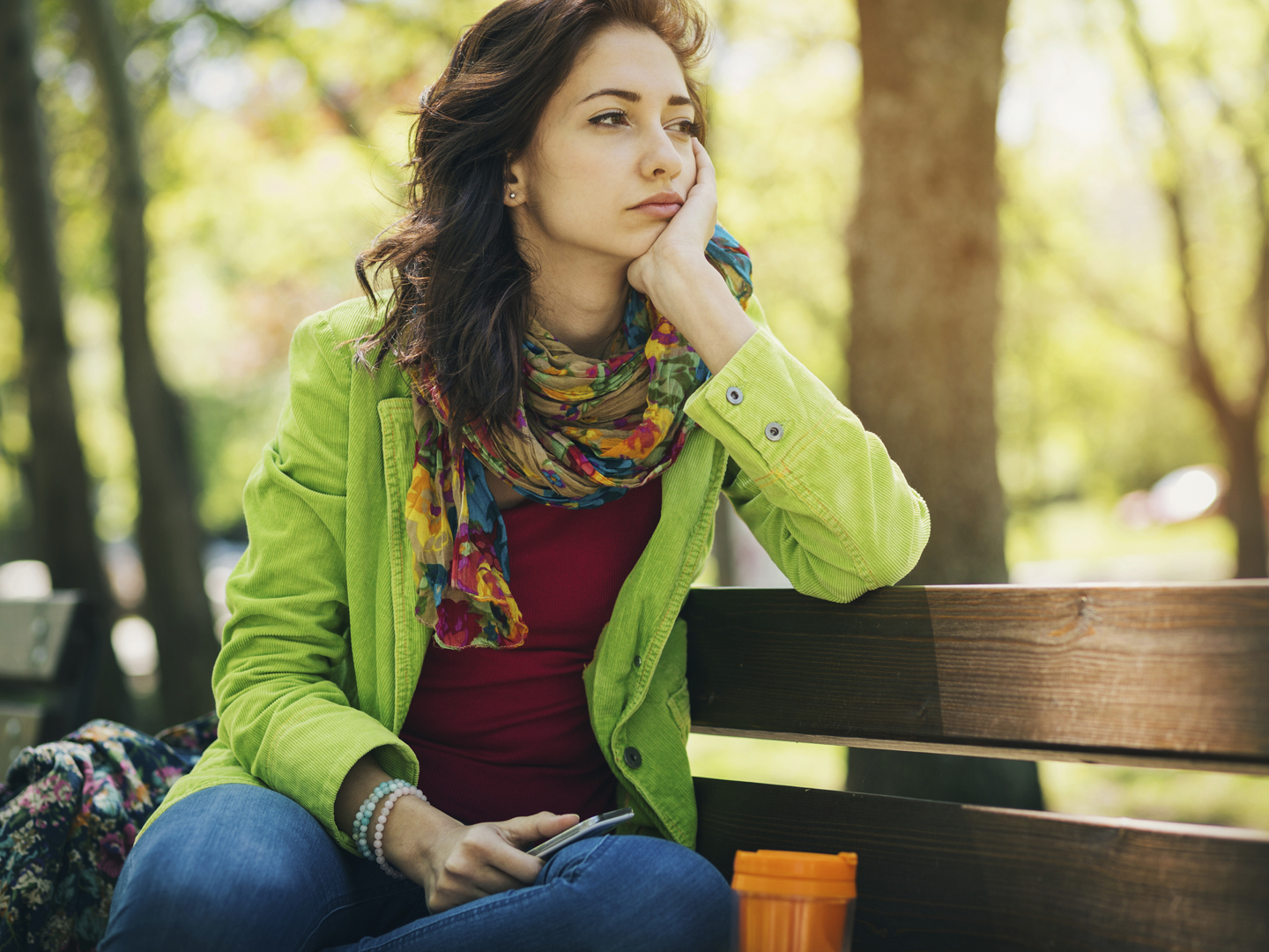 Teenage girl feeling depressed after breaking up with her boyfriend.